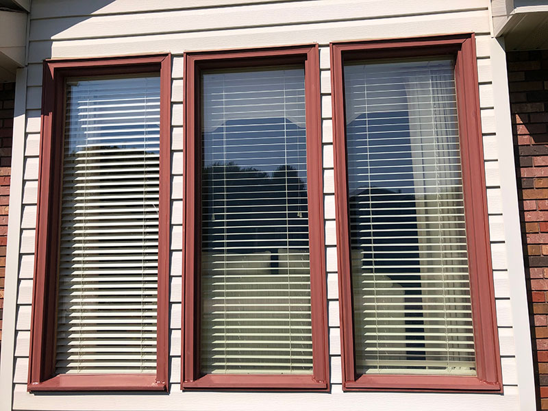 Newly caulked exterior windows on a residential property